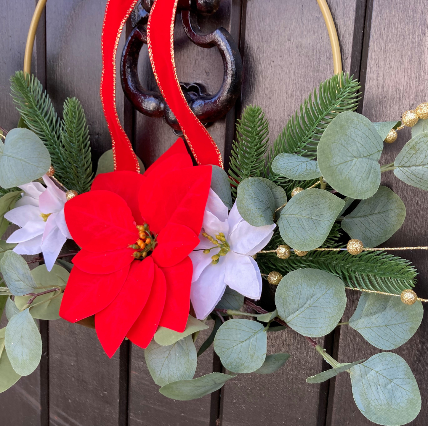 Christmas Poinsettia & Eucalyptus Wreath Presented On A Hoop