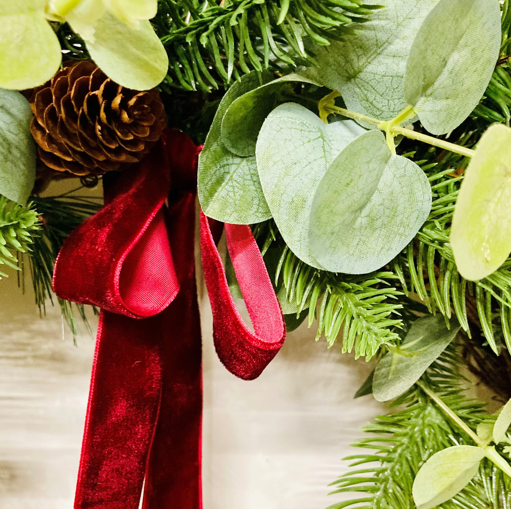 Christmas Wreath In A Traditional Style With Faux Berries, Pinecones and Pines