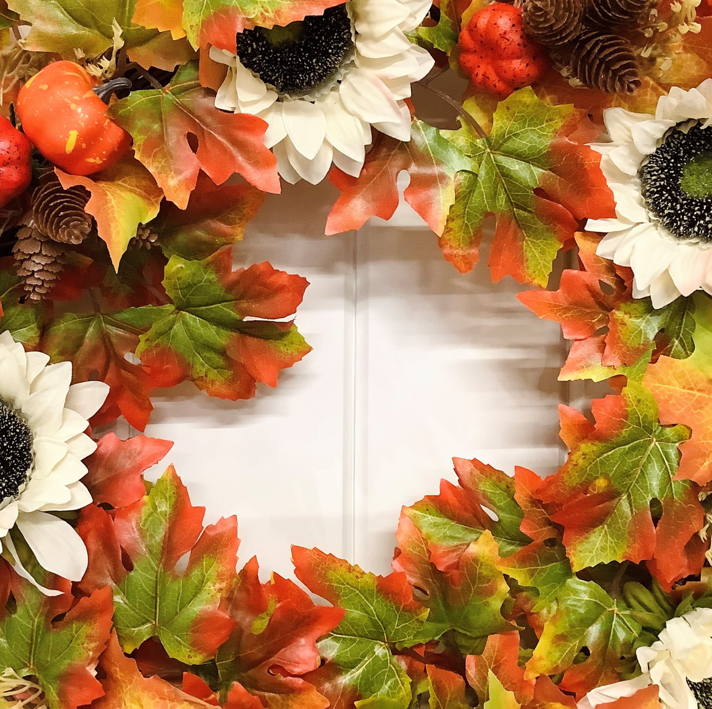 Cream Sunflowers with Pine Cones & Pumpkins set on Autumnal Coloured Crisp Red and Green Maple Leaves Door Wreath