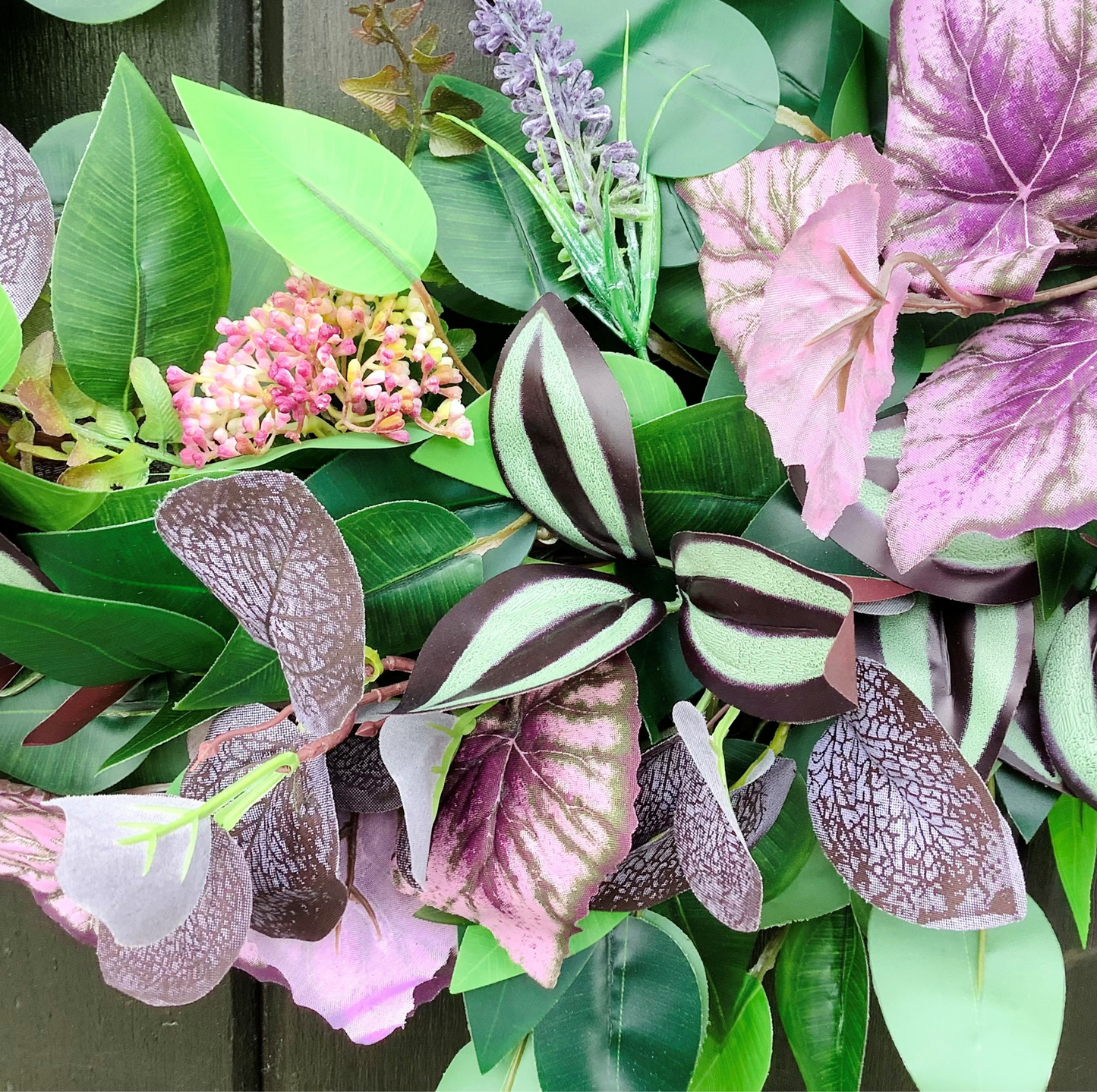 green ficus leaves, purple eucalyptus, mauve angel leaves, tradescantia leaves, autumn winter door wreath