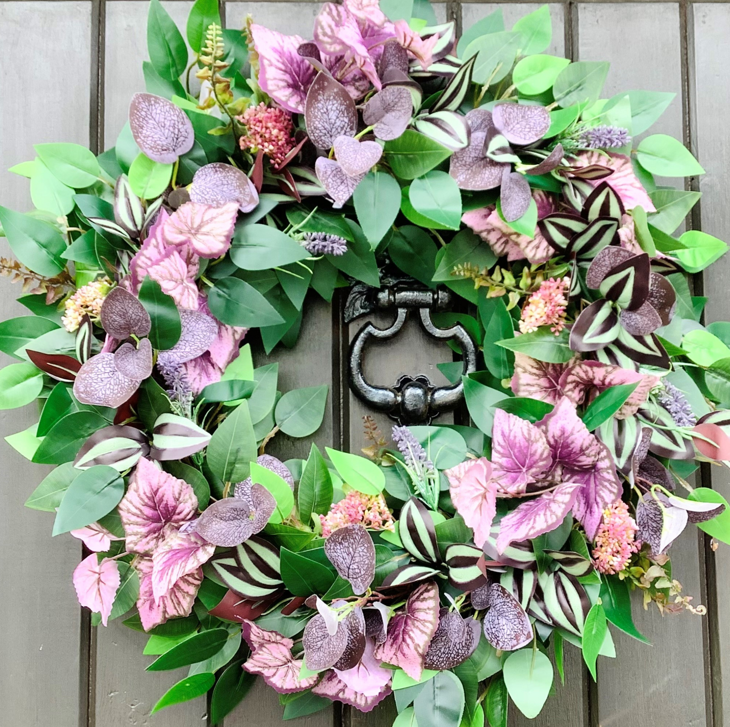 green ficus leaves, purple eucalyptus, mauve angel leaves, tradescantia leaves, autumn winter door wreath