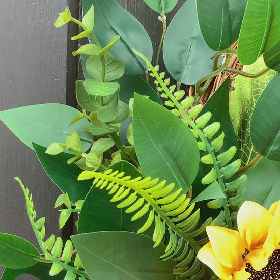 various sizes of bright yellow sunflower half style door wreath