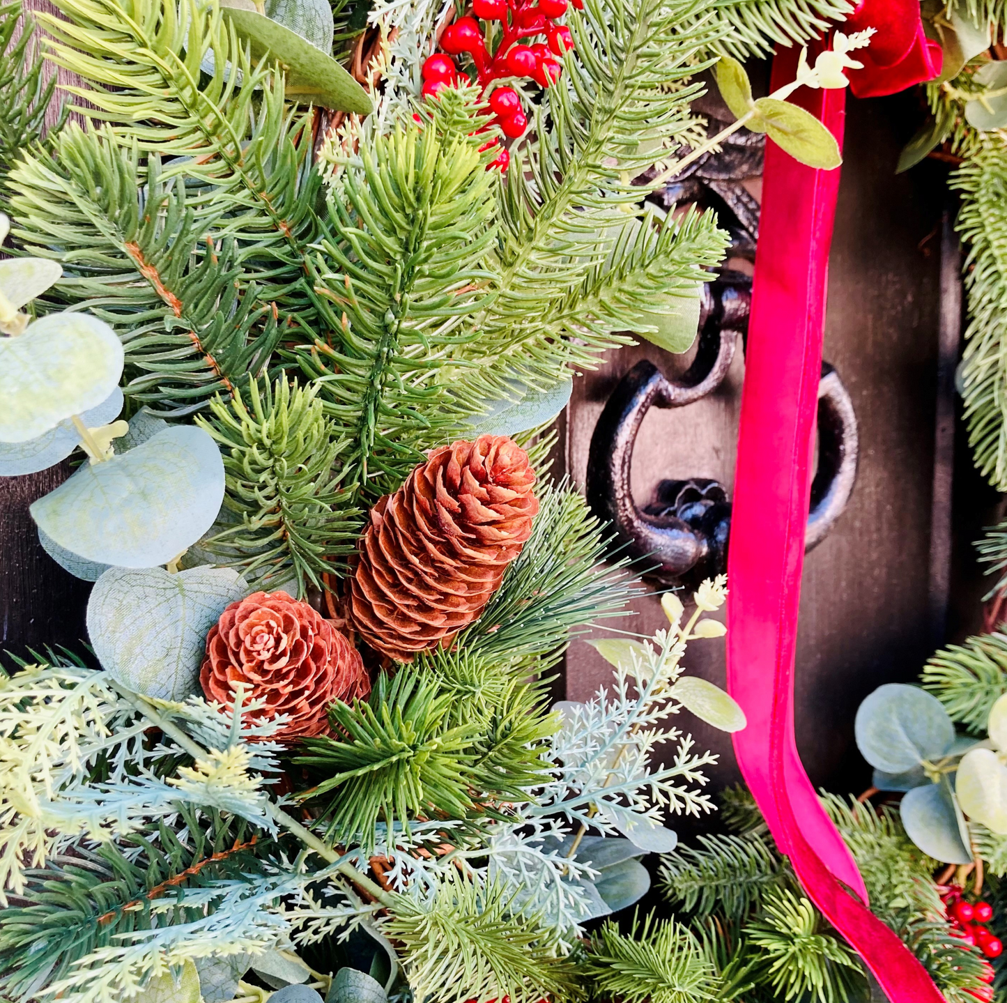 Christmas Wreath In A Traditional Style With Faux Berries, Pinecones and Pines