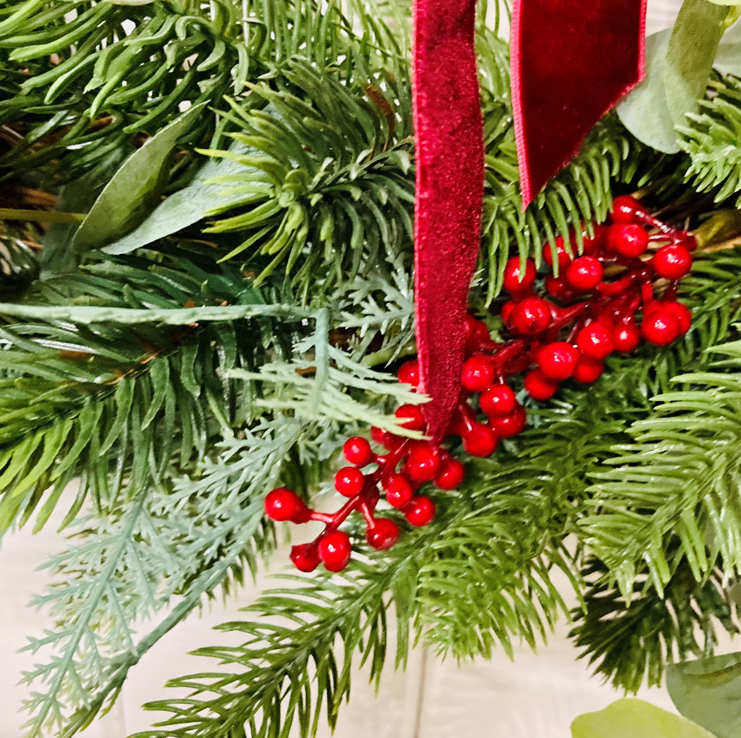 Christmas Wreath In A Traditional Style With Faux Berries, Pinecones and Pines