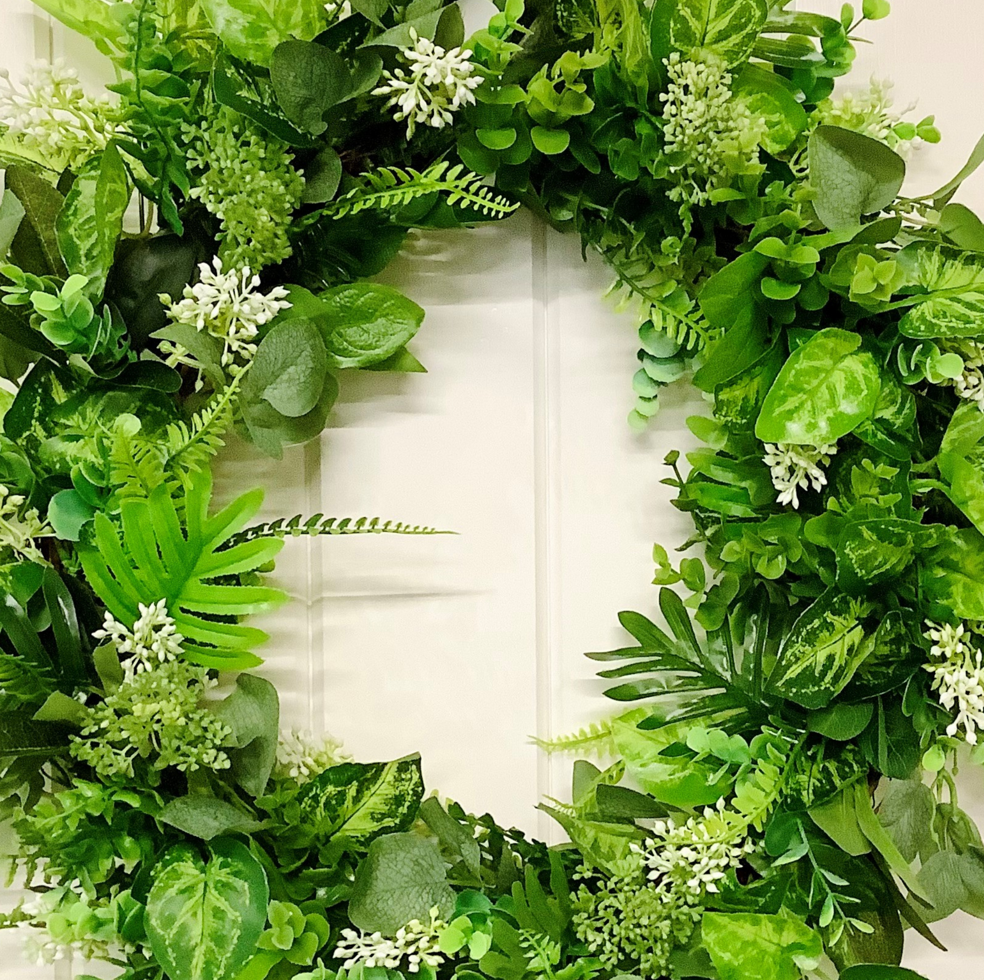 year round greenery and mixed berry door wreath