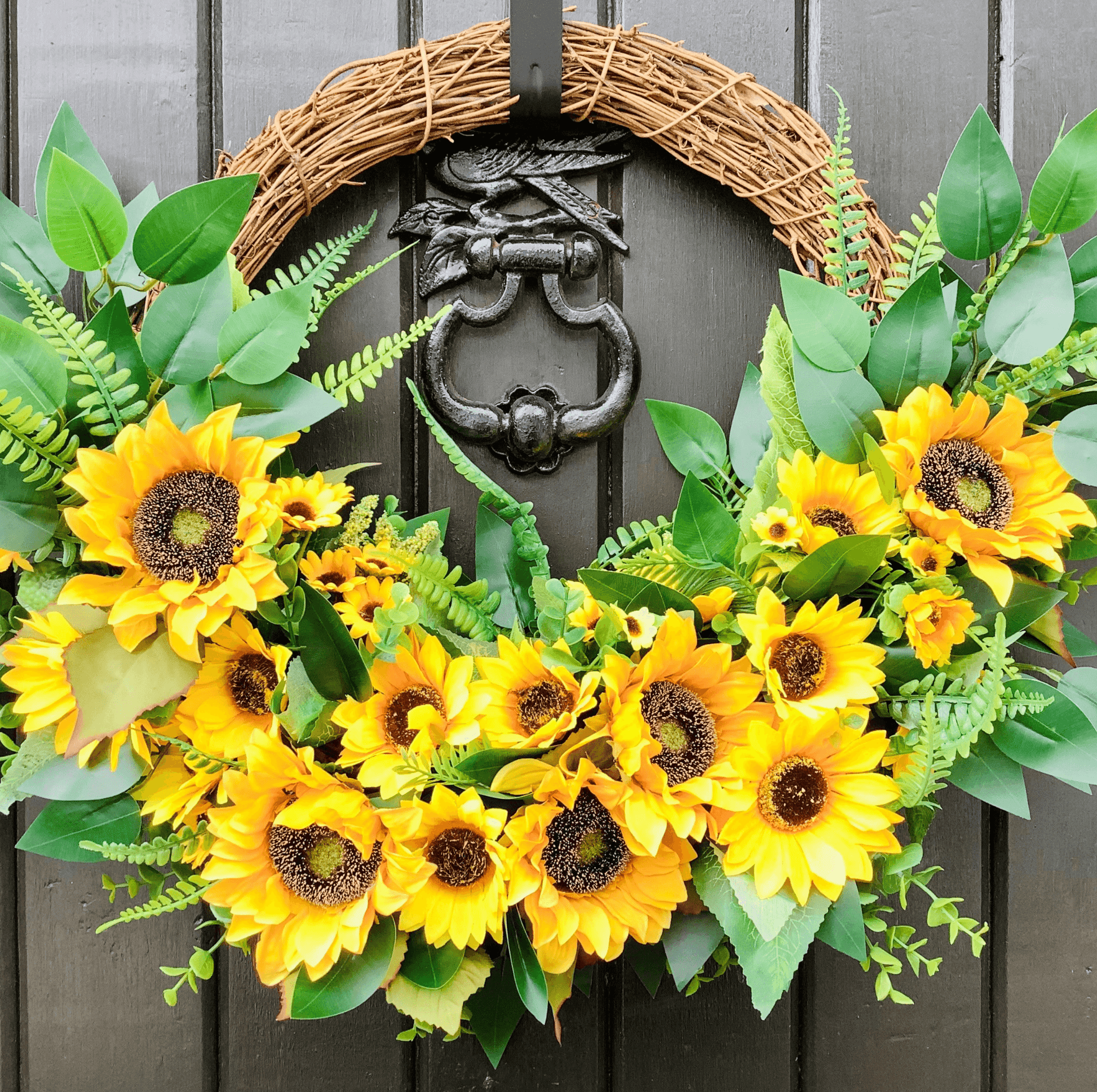 various sizes of bright yellow sunflower half style door wreath